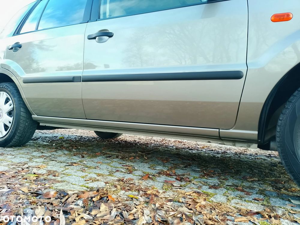 Ford Fusion 1.4 + - 9