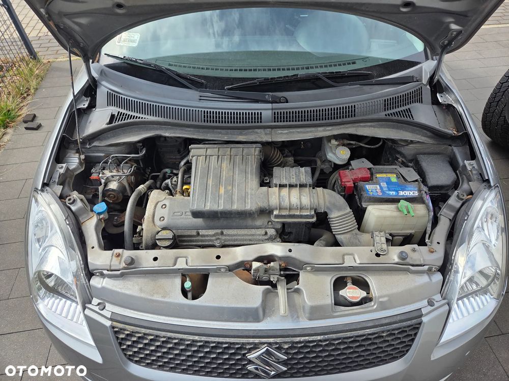 Suzuki Swift 1.3 Club - 11