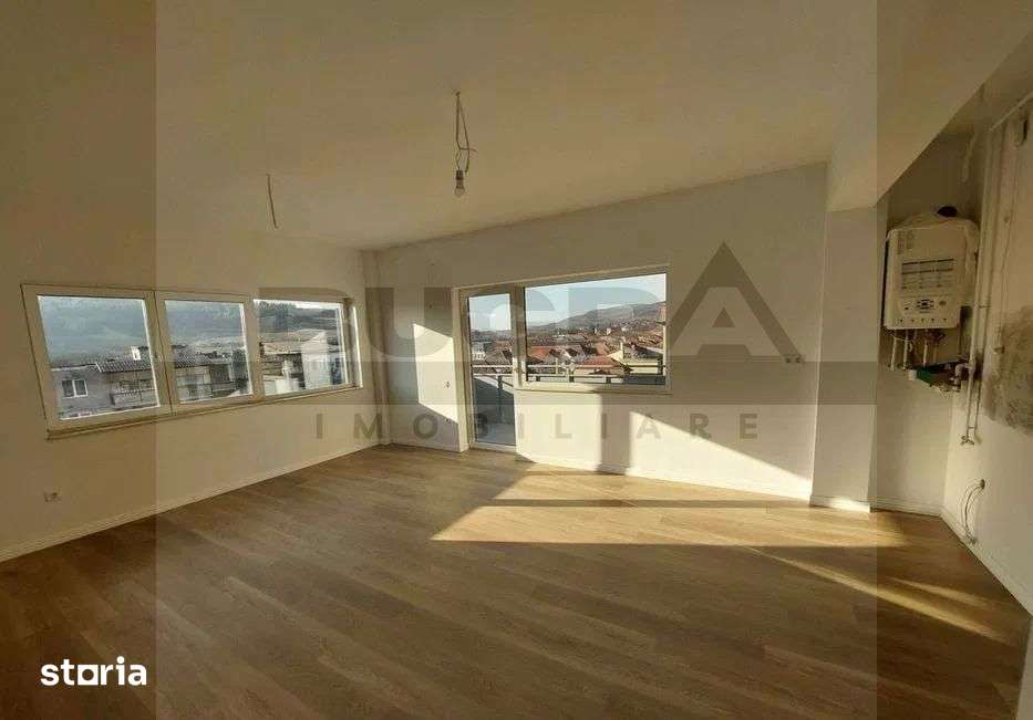 Apartament finisat cu 3 camere, 75 mp, parare, zona Baciu Regal — fotografia 1