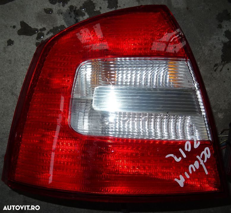 Stop stanga Skoda Octavia berlina din 2012 volan pe stanga - 1