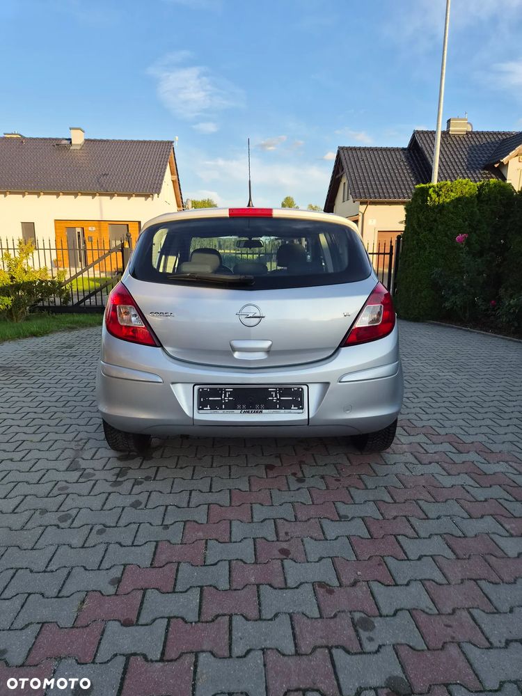 Opel Corsa 1.4 16V Enjoy - 6