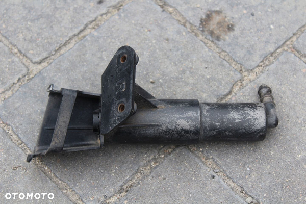 SPRYSKIWACZ LAMP PRAWY TOYOTA AVENSIS T25 LIFT 06-08r