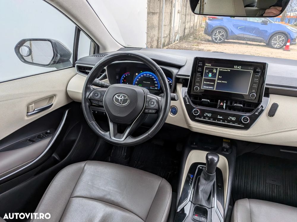 Toyota Corolla 1.8 HSD Exclusive Plus tapiterie Gri - 14