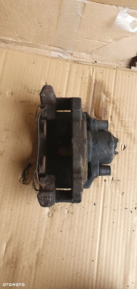 Zacisk hamulcowy lewy przód przedni VW Touran 1T0 - 4