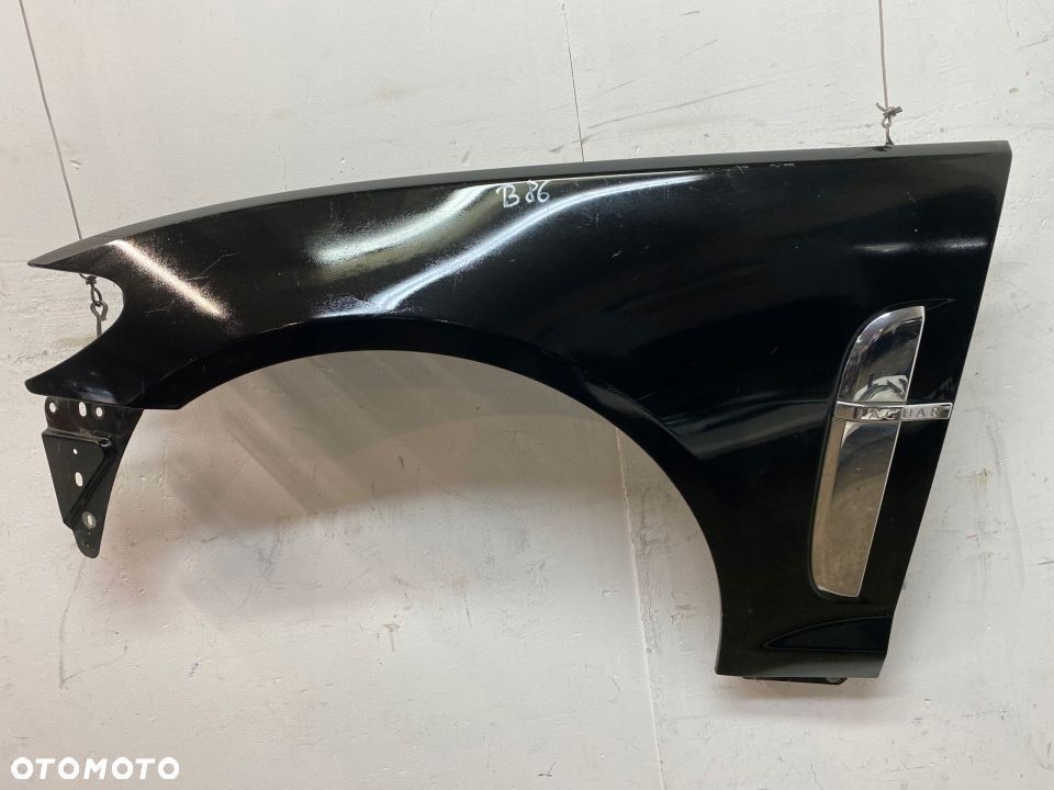 Jaguar XF blotnik przedni lewy