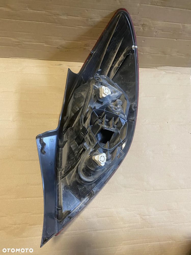 Lampa Opel Corsa D lewa 5d OE - 4