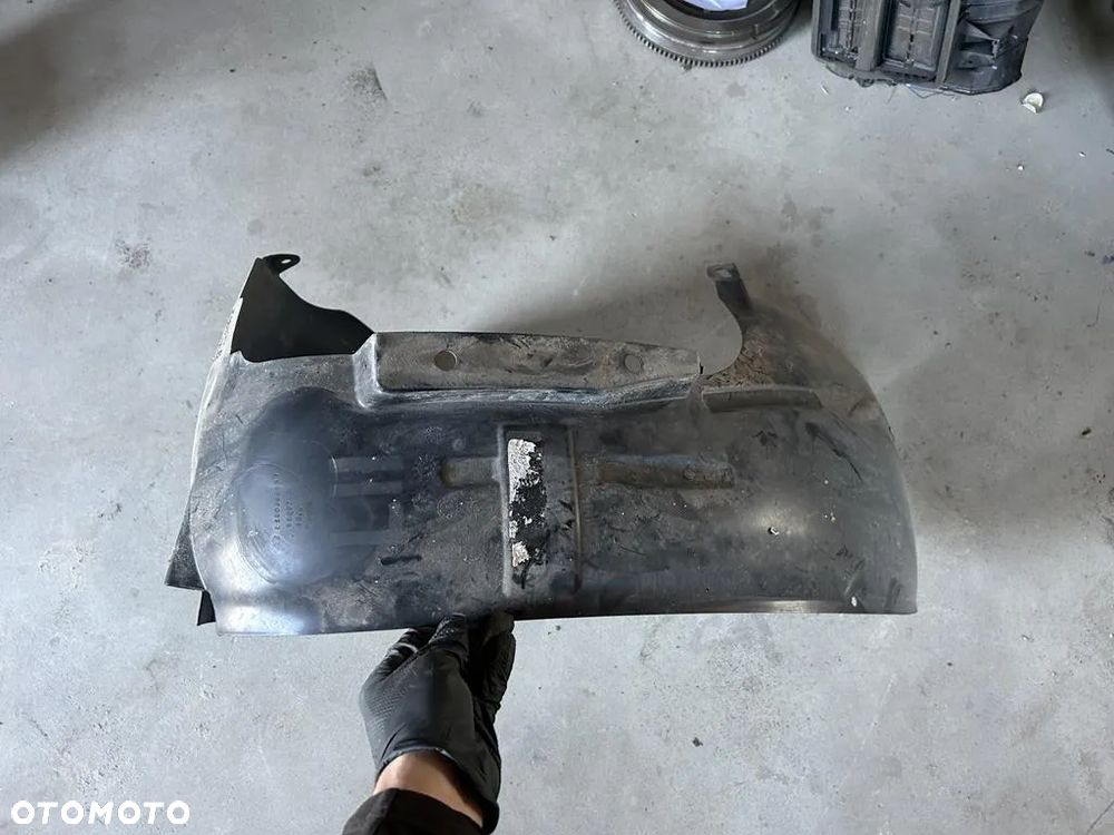 Nadkole lewe przednie Dodge Caliber 05303867AE - 2