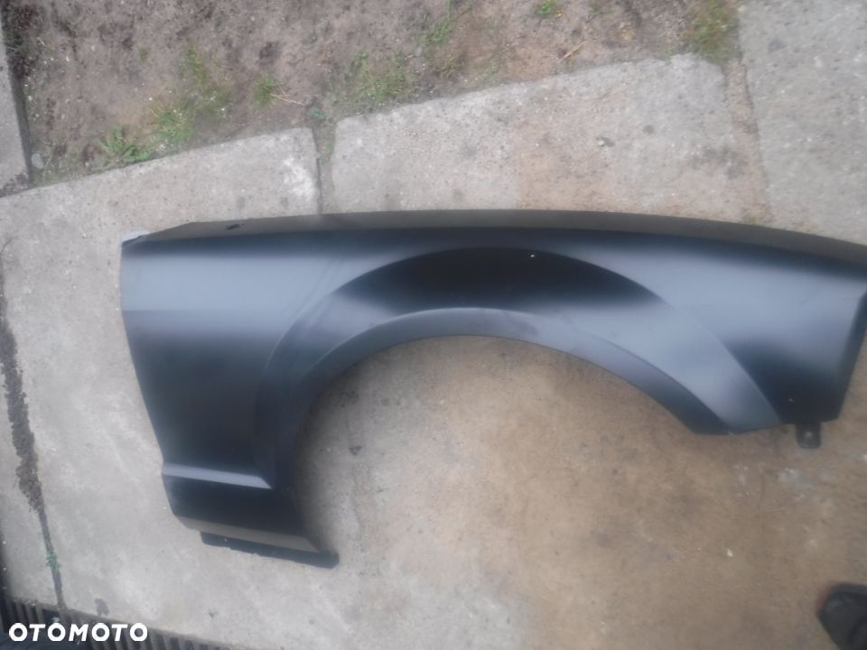 Ford Mustang V blotnik prawy przod - 2