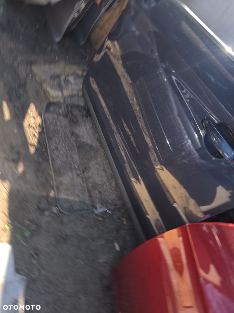 Drzwi  lewy przód  ford  kuga  mk1  w  kolorze  E 0 - 3