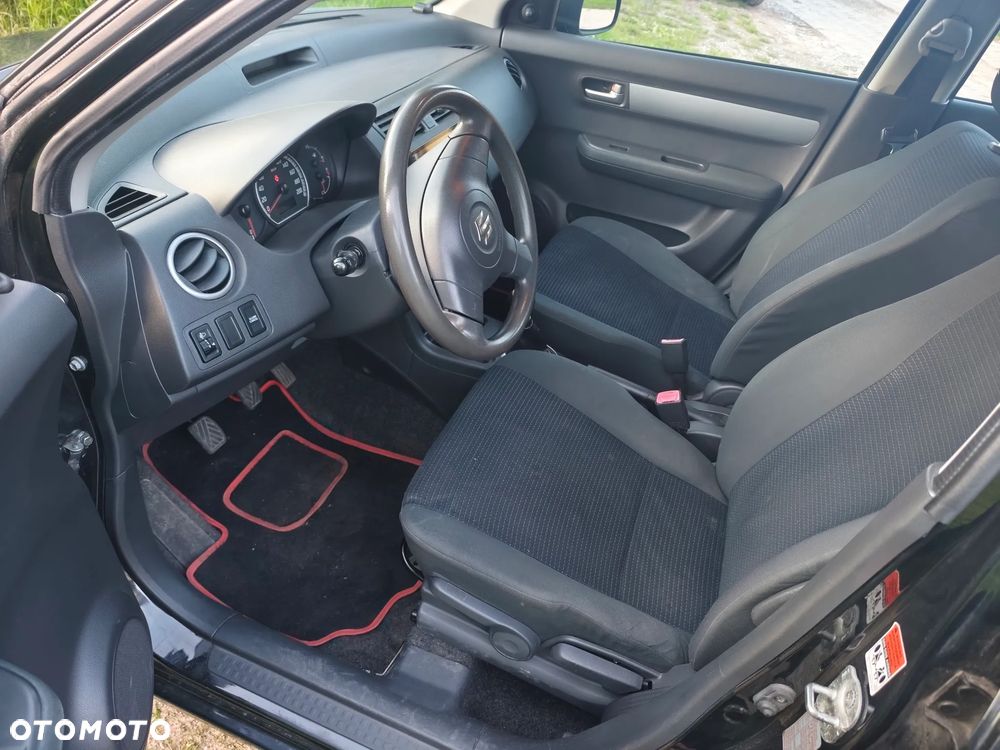 Suzuki Swift 1.3 Club - 7