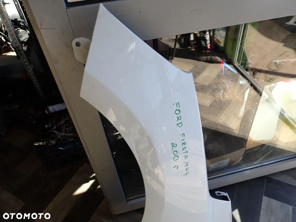 FORD FIESTA MK4 BŁOTNIK LEWY - 2