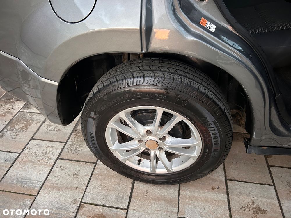 Suzuki Grand Vitara 2.0 - 12