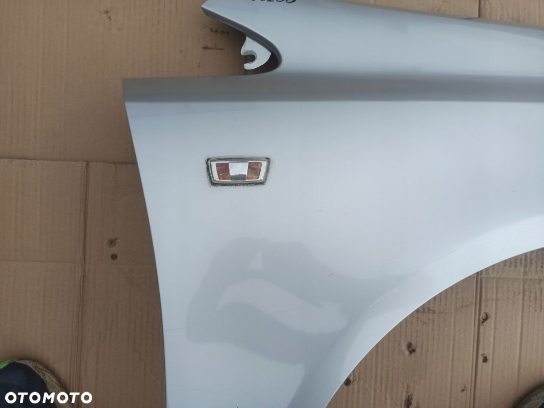 Błotnik prawy przód OPEL CORSA D Z157 06-11 - 5