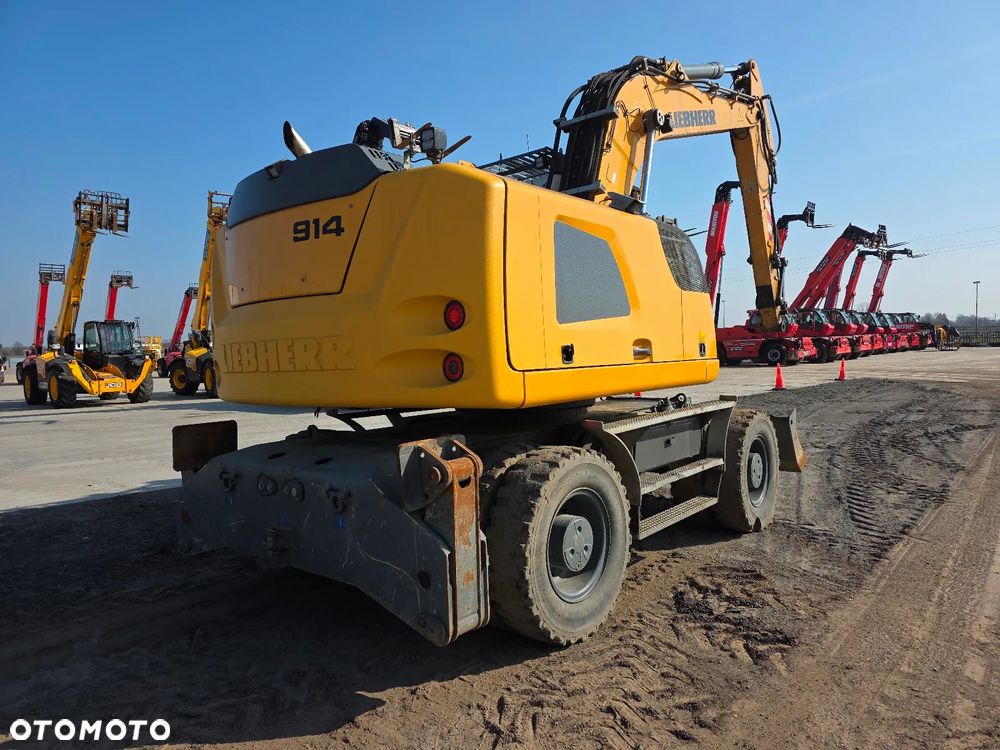 Liebherr A 914 Litronic jak TEREX CAT SENNEBOGEN M497 - 4