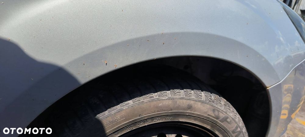 BŁOTNIK PRAWY PRZÓD FORD FOCUS MK2 - 2