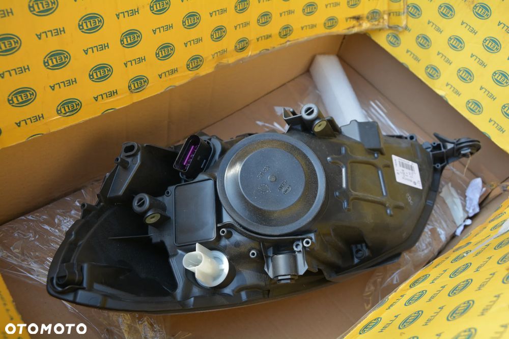 Skoda Fabia / Roomster Reflektor HELLA 1EL 010 417-371 (Z lewej) - 4