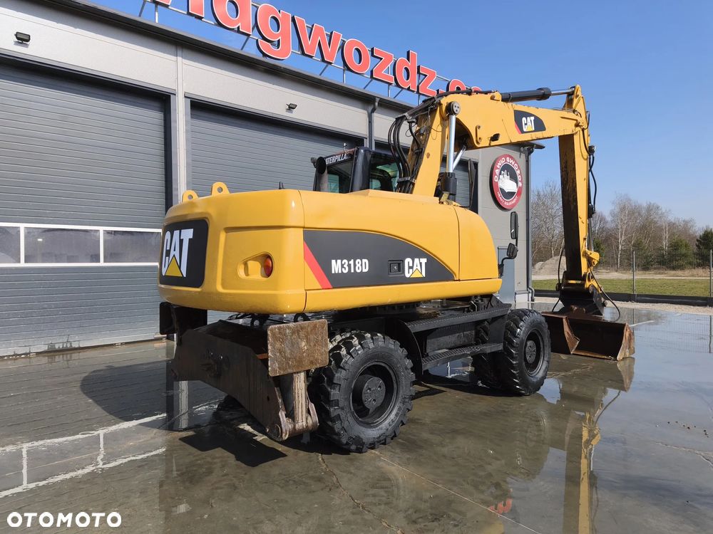 Caterpillar M318D - 5