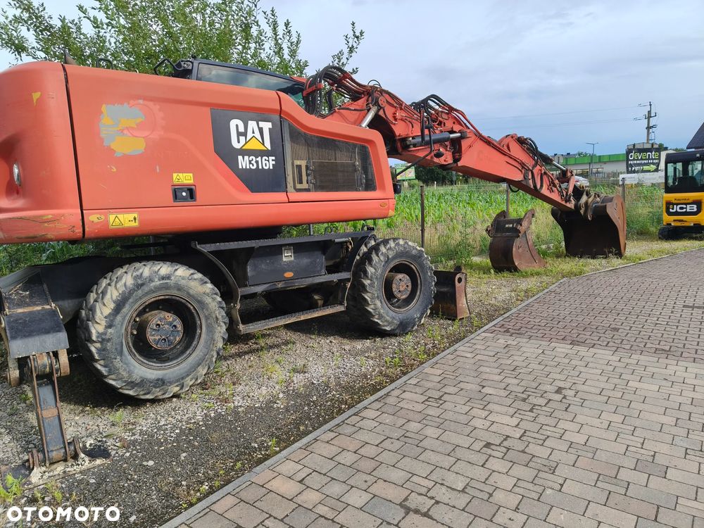 Caterpillar M316 - 12