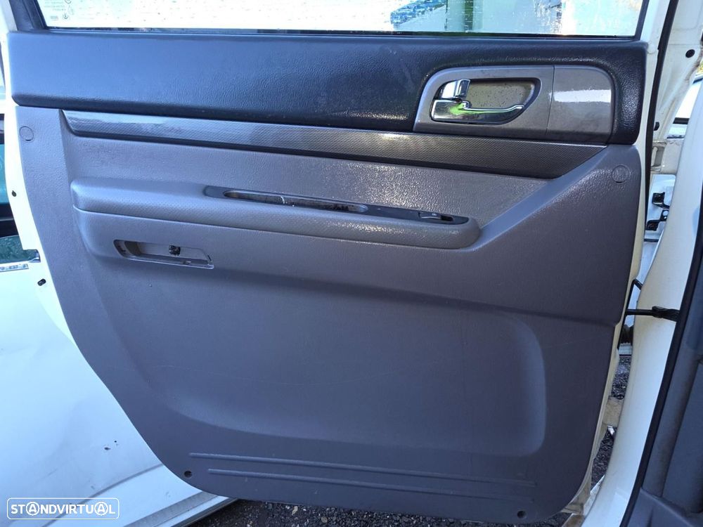 FORRA DA PORTA TRASEIRA ESQUERDA SSANGYONG RODIUS - 1