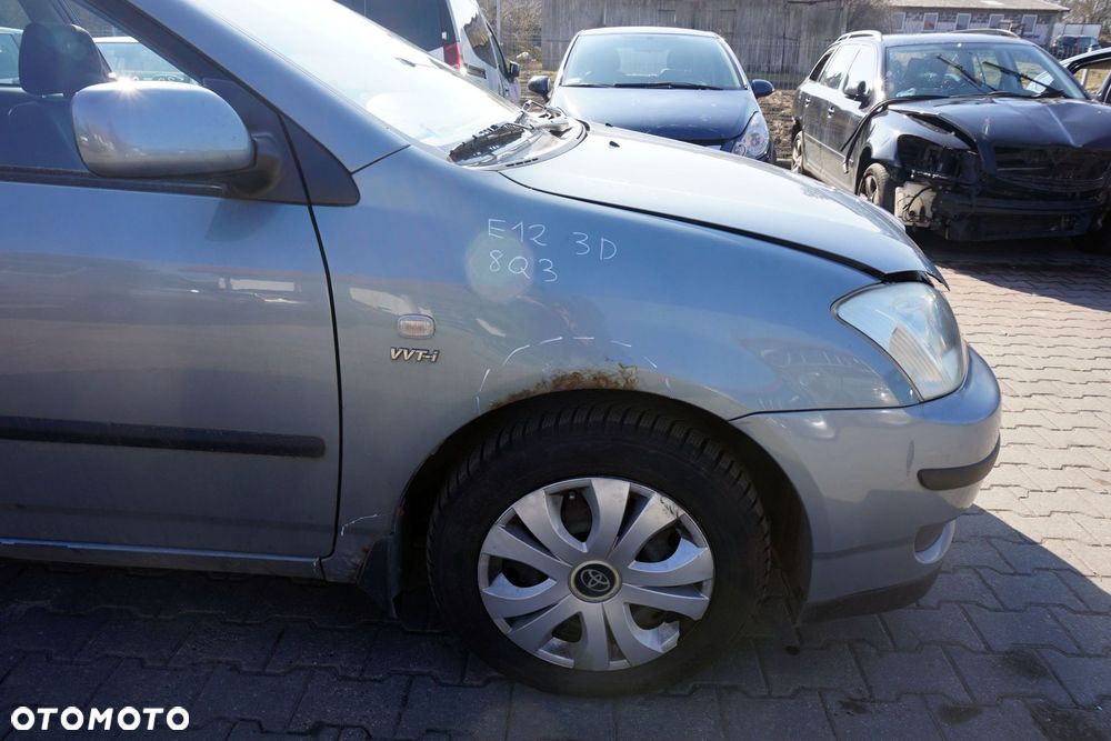 MASKA ZDERZAK BŁOTNIKI LAMPY COROLLA E12 8Q3  TOYOTA 2001-2004 SREBRNY PRZÓD KOMPLETNY - 14