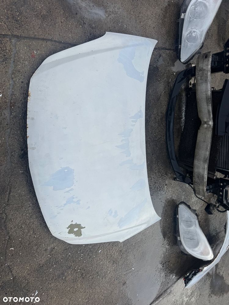 Opel Corsa D biała maska drzwi prawe lewe przednie przód pas przedni chłodnice wody klimy lampy lampa przednia prawa lewa błotnik prawy lewy biały białe zderzak przód przedni klapa bagażnika klapa tył tylnia lampa prawa lewa belka pod zderzak - 2