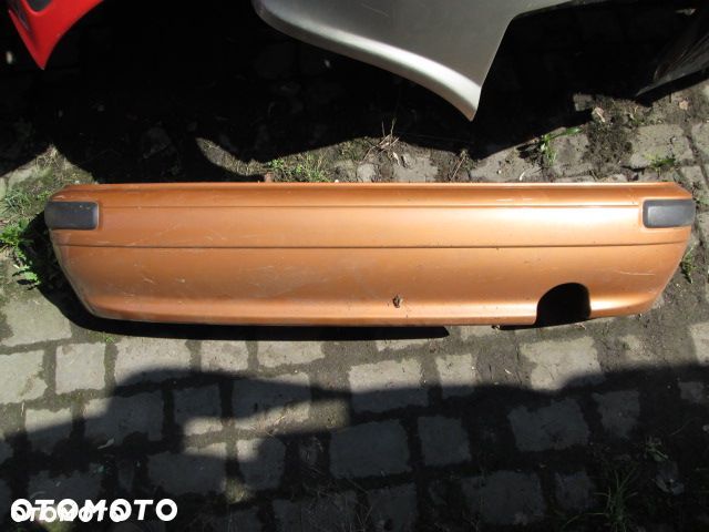 ZDERZAK TYLNY NISSAN MICRA K11 98-00 - 2