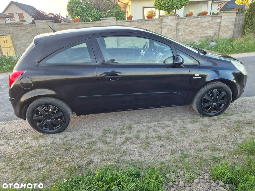 Opel Corsa 1.2 16V Cosmo - 9