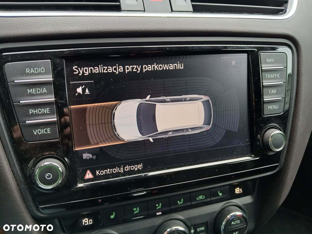 Skoda Octavia 2.0 TDI DSG L&K - 23