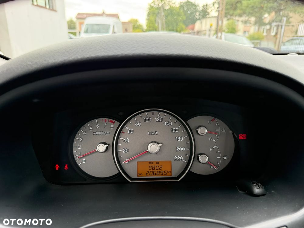 Kia Carens 2.0 CVVT EX - 19