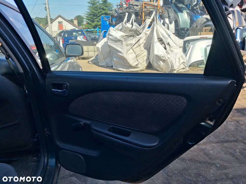 TOYOTA AVENSIS T22 LIFT LAK 653 DRZWI PRAWY TYL - 5