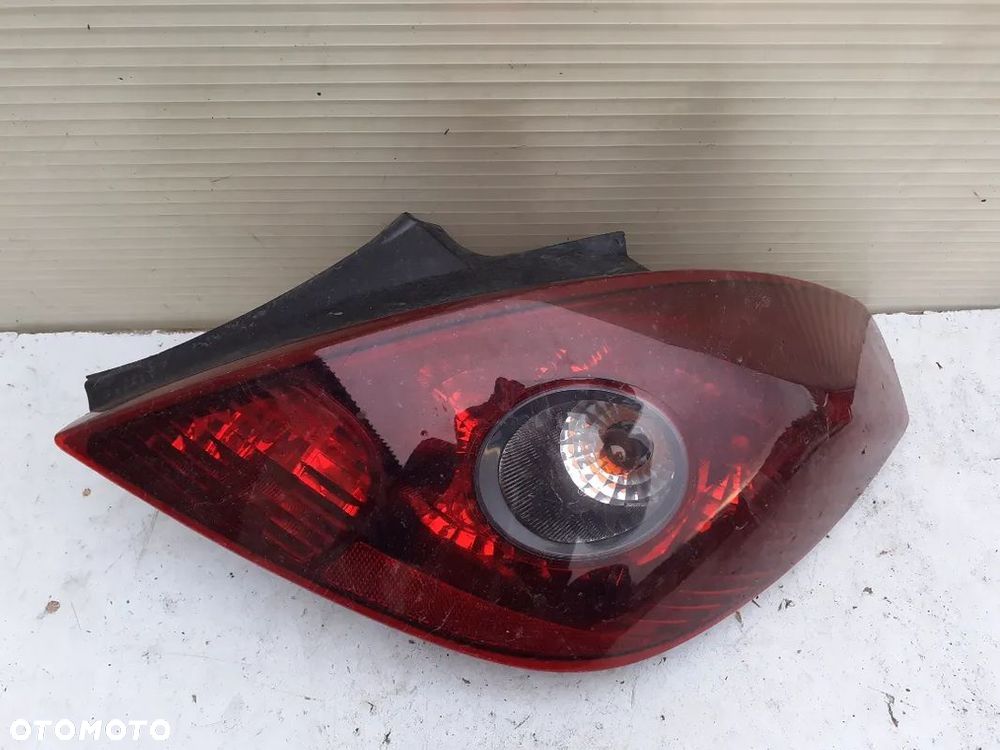 LAMPA TYŁ TYLNA PRAWA OPEL CORSA D ORYGINAŁ WYSYŁKA! - 1
