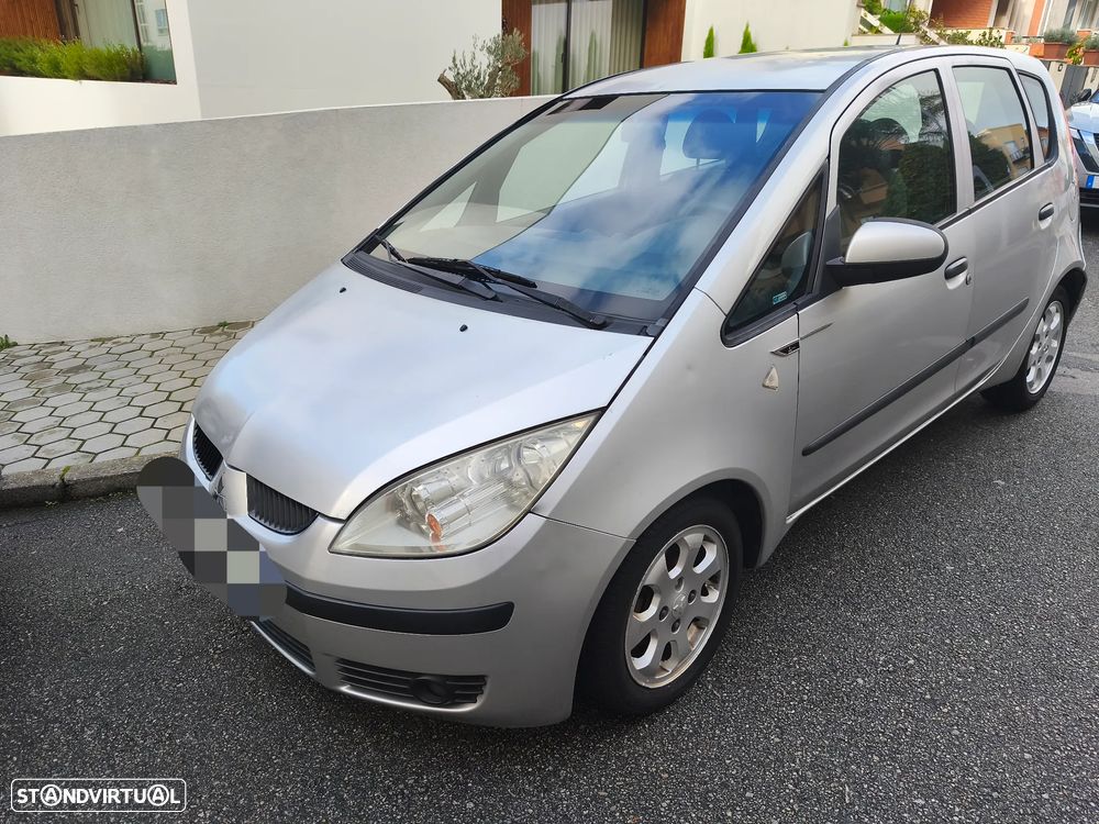 Mitsubishi Colt 1.1 E-motion P.Segurança - 1