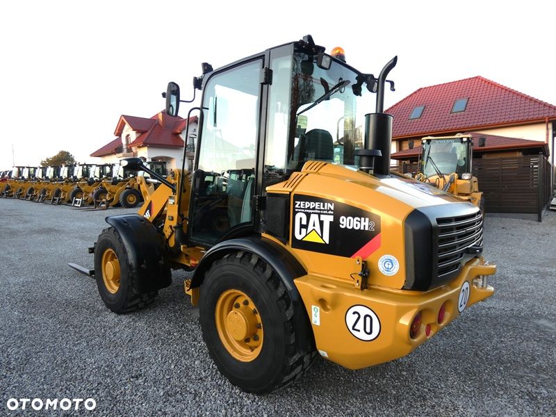 Caterpillar CAT 906H2 Z Niemiec / Ładny Stan / 5.958mtg / kilka sztuk / - 2