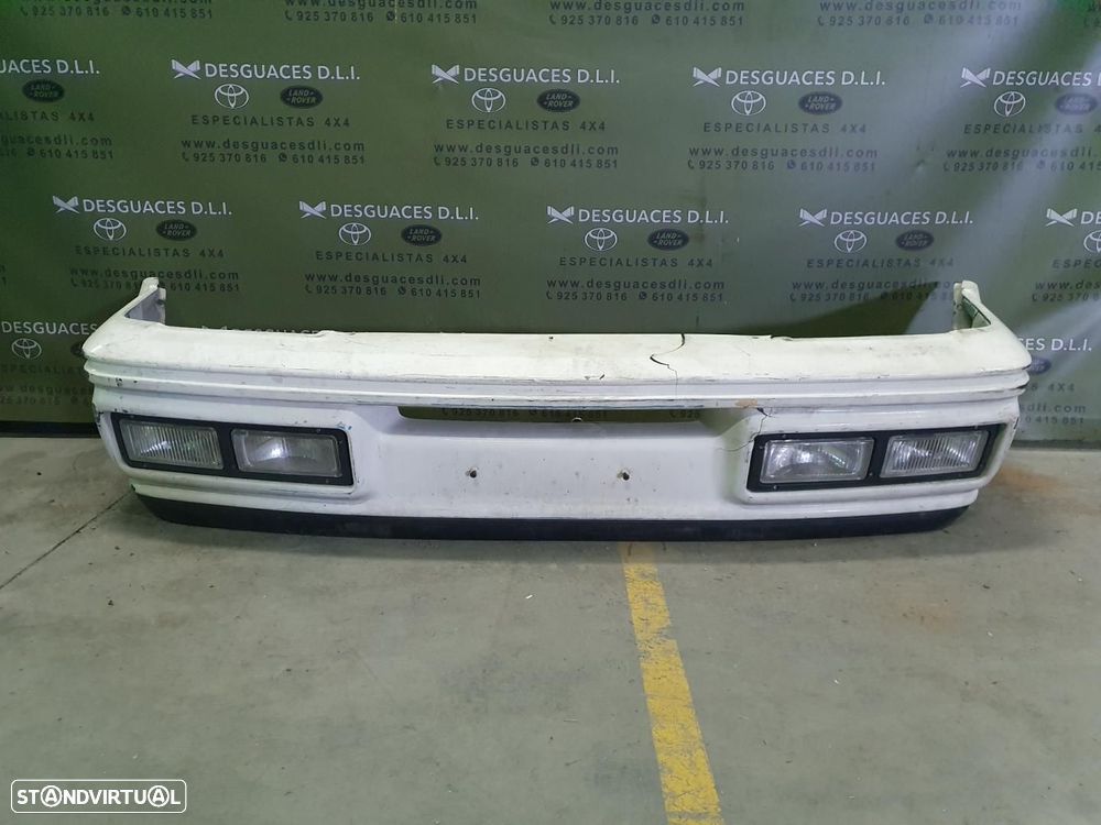 PÁRA-CHOQUES DIANTEIRO FORD FIESTA BERL.COURIER - 1