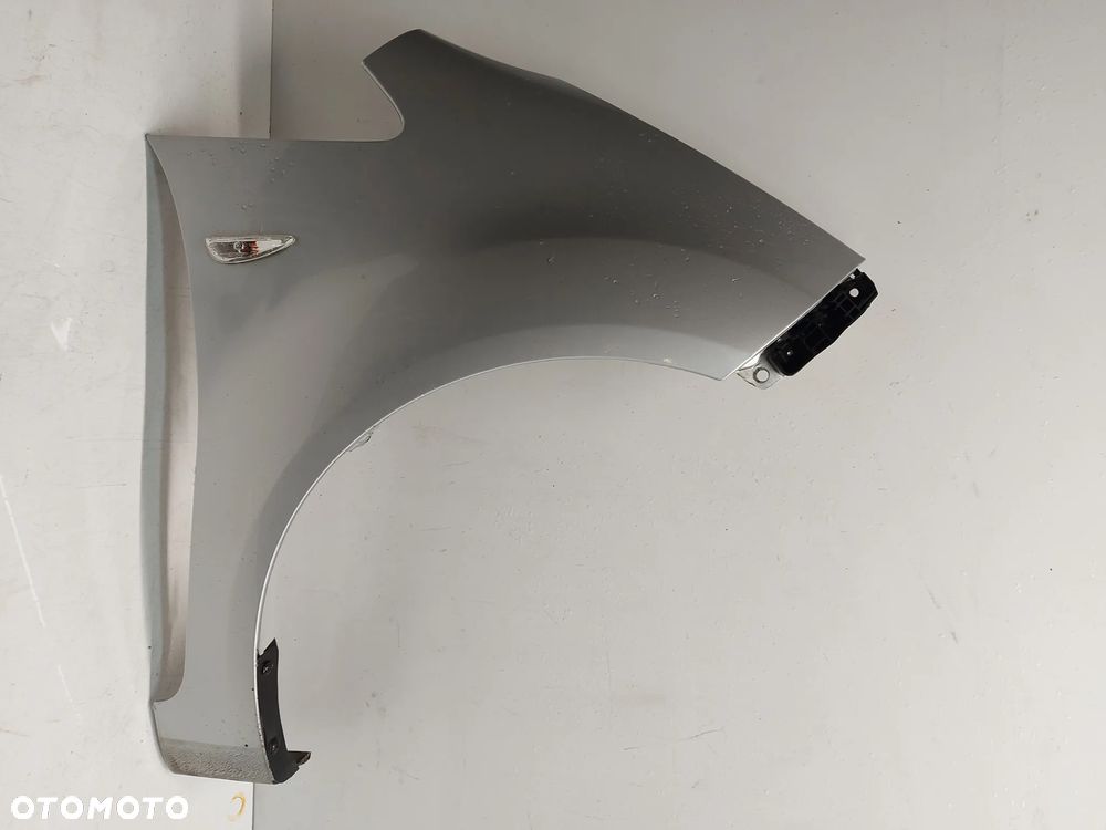 ^ BŁOTNIK PRZÓD PRZEDNI PRAWY KIA VENGA 09-15r 2R SREBRNY - 1