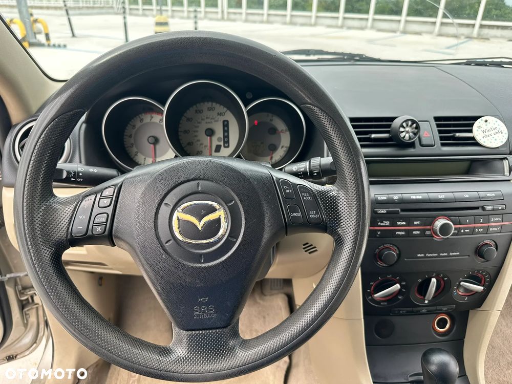 Mazda 3 2.0 Exclusive + - 14