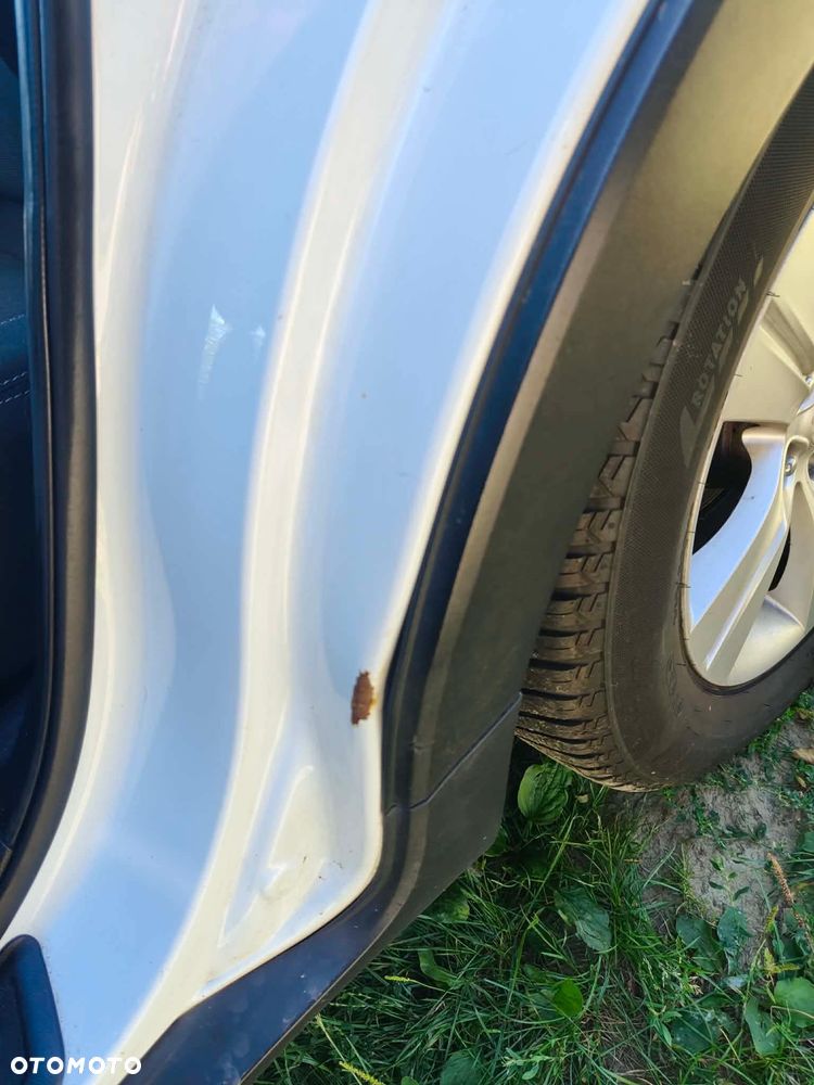 Kia Sportage 2.0 L - 7