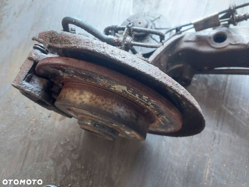 BELKA OŚ ZAWIESZENIA TYŁ TARCZE Z ABS OPEL ASTRA H HB 5D - 3