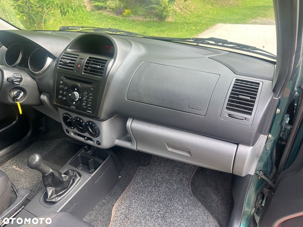 Subaru Justy 1.3GX 4WD AIR - 12