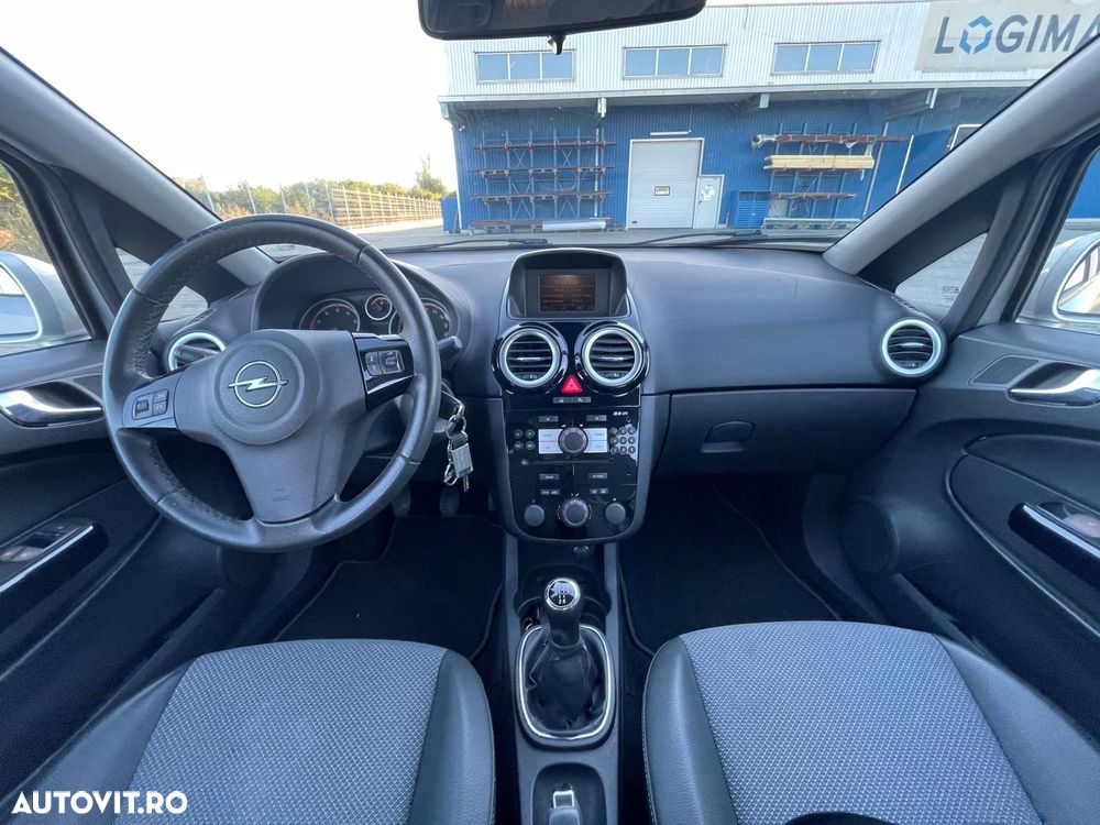 Opel Corsa 1.2i Cosmo - 7
