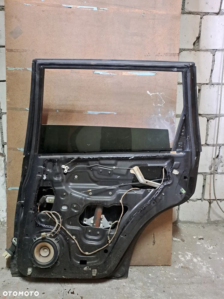 Drzwi Ssangyong Rexton I 01-07' prawy tył (czarne) - 2