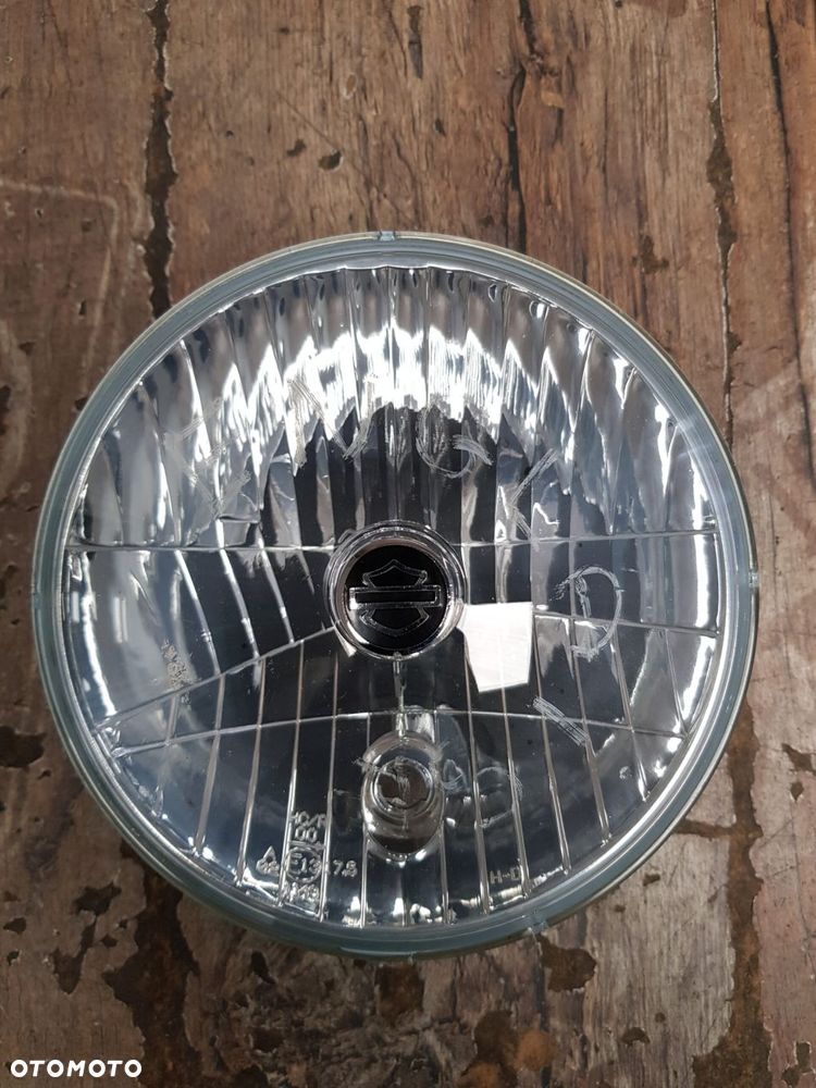 Oryginalny klosz reflektora Harley Dyna Softail 68344-05 - 2