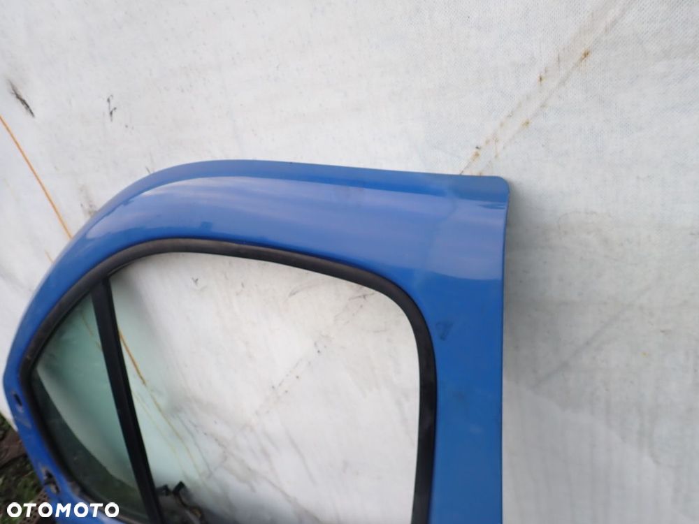 DRZWI LEWY PRZÓD RENAULT TRAFIC II 1.9 - 3