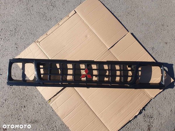 GRILL ATRAPA MITSUBISHI L200 96-01
