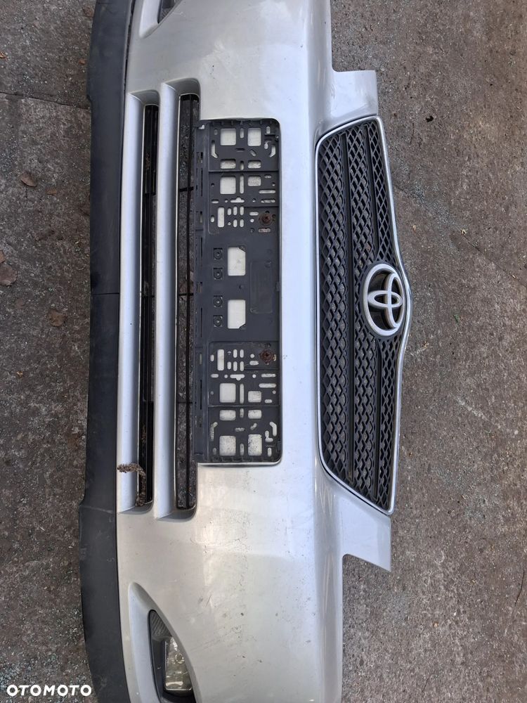 ZDERZAK  PRZÓD PRZEDNI TOYOTA COROLLA - 2