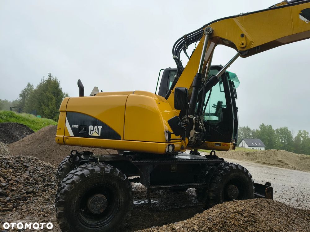 Caterpillar M313D - 8