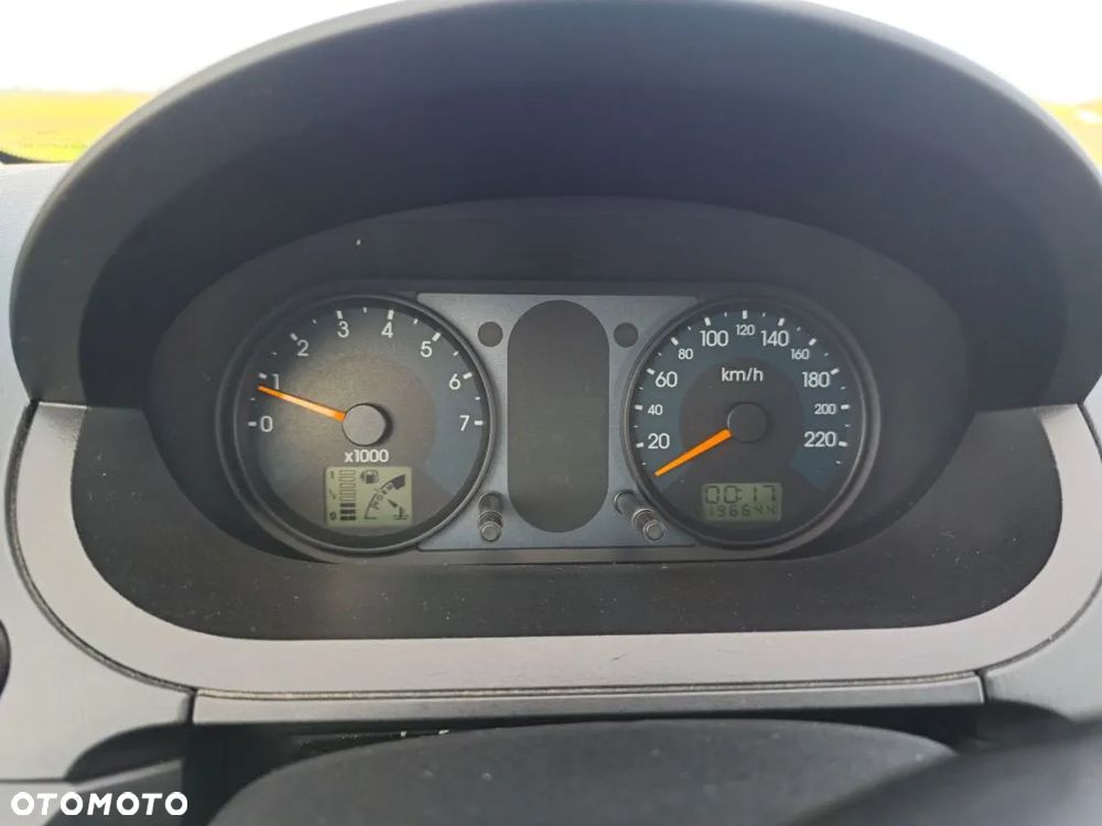 Ford Fiesta 1.4 Ghia - 31