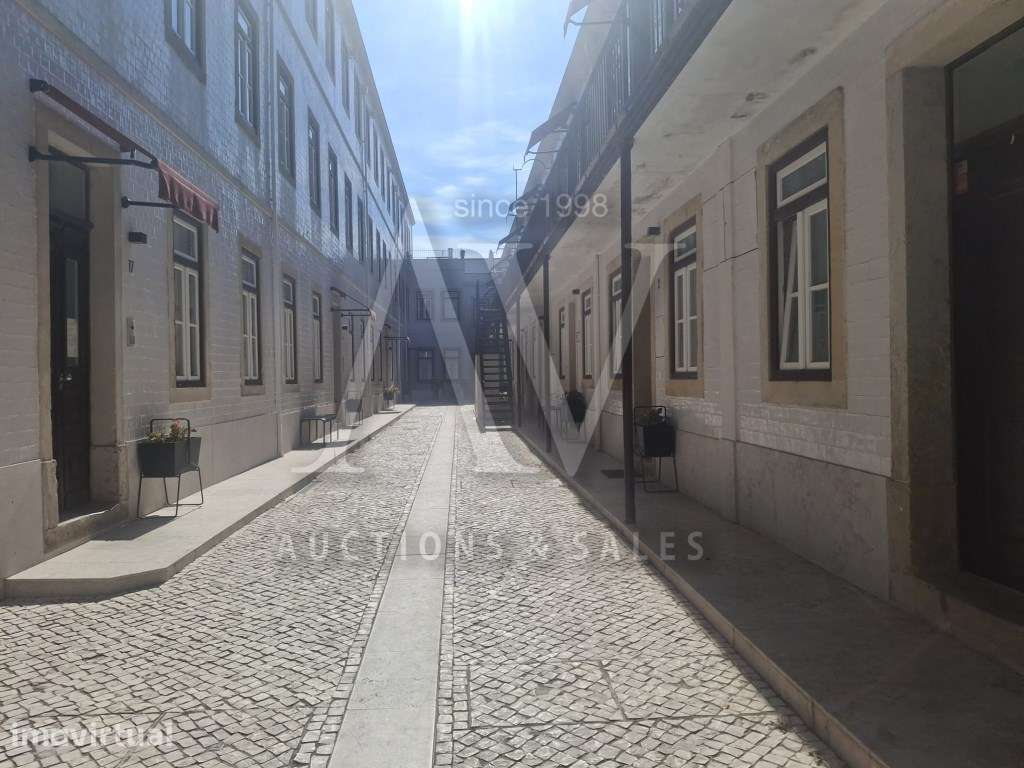 Loja convertida em T1, com 62,27m2 de área bruta; - Grande imagem: 4/15