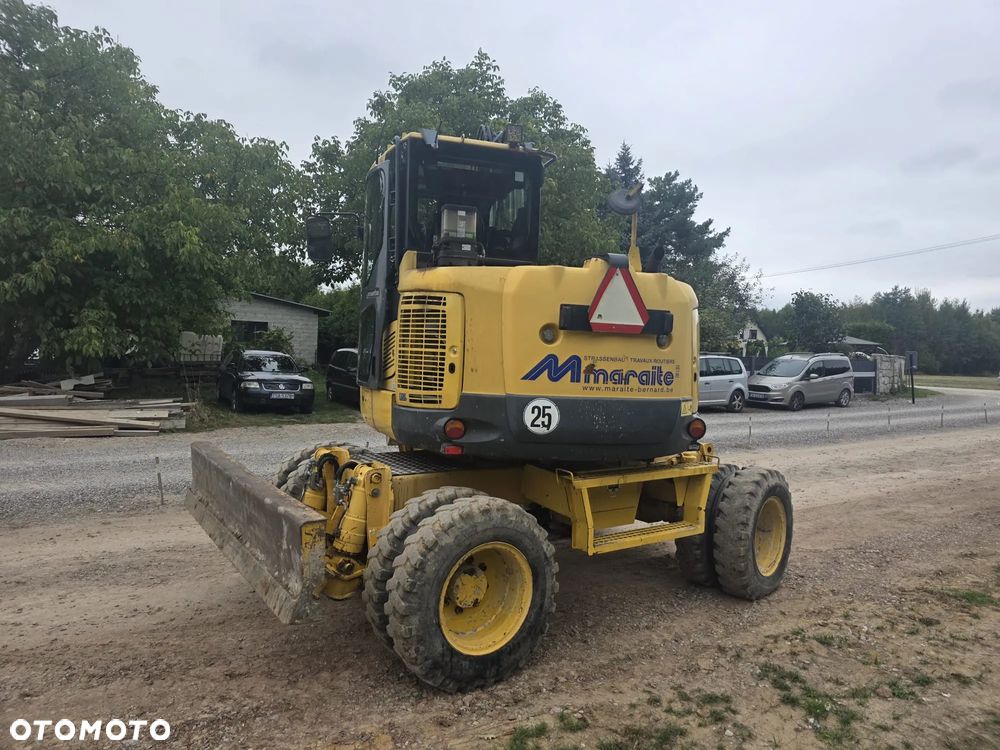Komatsu 118 MR - 4