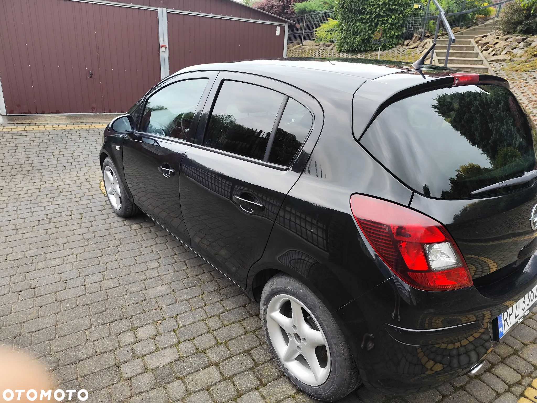 Opel Corsa 1.4 16V Active - 12